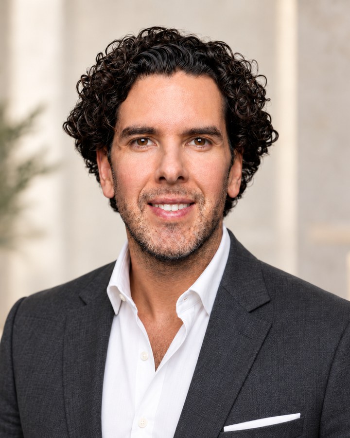 Victor Gini in a charcoal jacket